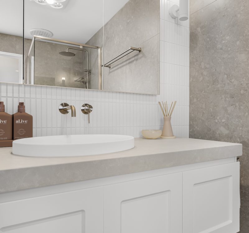 Full view of the Croydon Hills bathroom featuring a semi-frameless shower, custom vanity unit, and high-end finishes in a contemporary setting.